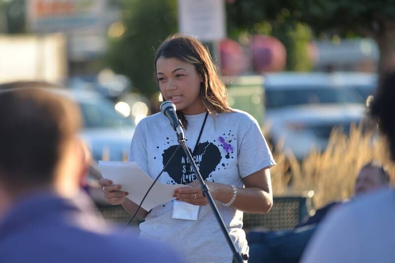 Lauren Metzler, 34, of Rock Falls, spoke about her brother, Tevin Shae Rumley, during a Sauk Valley Voices of Recovery Overdose Awareness event in Dixon on Thursday, Aug. 31, 2023. Metzler said her brother, who was 28, died from fentanyl poisoning in 2020 after becoming addicted following a foot injury in college.