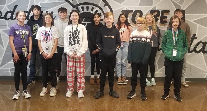 Sycamore Middle School November 2024 students of the month pose for a photo: Catalina Sanchez, Benjamin Corn, Brinley Young, Caleb Huseman, Addison Kolzow, Nolan West, Isabel Mercado-Vargas, Oliver McClain, Ayla Flewelling, Matthew Morris, Ella Lee and Sebastian Rathbun.