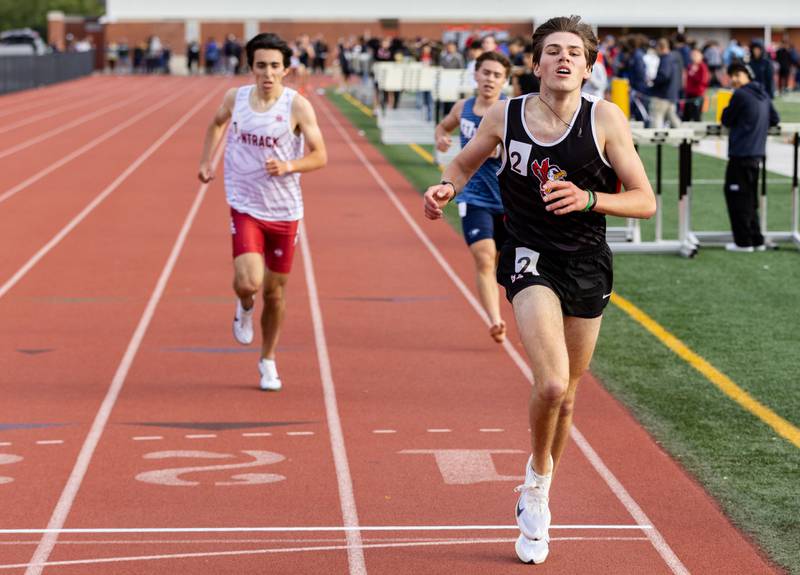 Benet Academy’s Finn Richards wins the 3200 meter race qualifying him for state finals during the Boys Track and Field Class 3A East Aurora Sectional hosted by East Aurora High School in Aurora on Thursday, May 22, 2025.