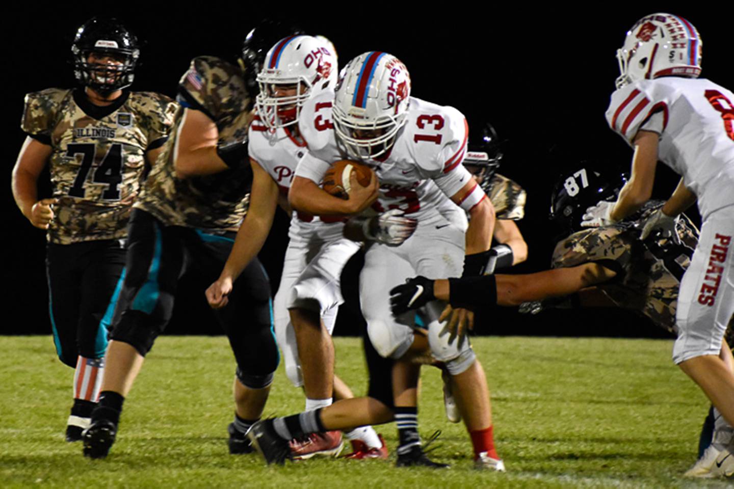 Ottawa's Ryder Miller runs the ball against Woodstock North during their game at Woodstock North High School on Friday, Sept. 24, 2021 in Woodstock.