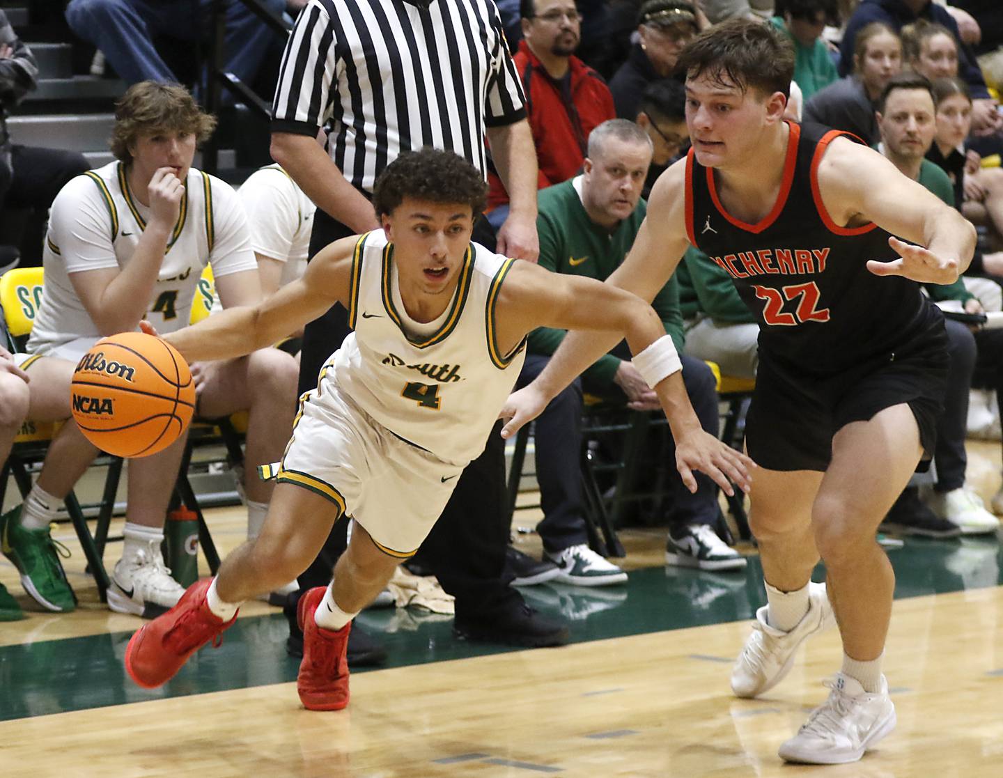 Crystal Lake South's Anthony Demirov brings the ball up the court against McHenry's Conner McLean during a Fox Valley Conference basketball game on Friday, Jan. 31, 2025, at Crystal Lake South High School.