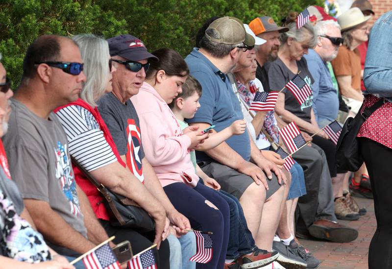 People line Locust Street in DeKalb Monday, May 29, 2023, to watch the DeKalb Memorial Day parade.