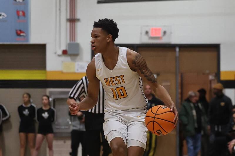 Joliet West’s Zion Gross looks for a play against Bolingbrook on Friday, Jan 24, 2025 in Joliet.