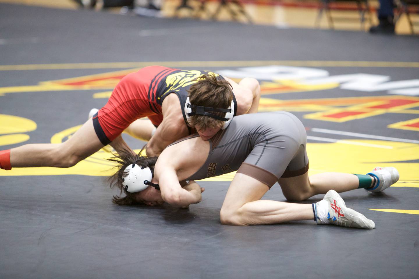 Batavia's Kai Enos competes against Jacobs Anthony Martinez in the 113 lb weight class at the Clint Arias Invitational on Saturday, Jan.18,2025 in Batavia.