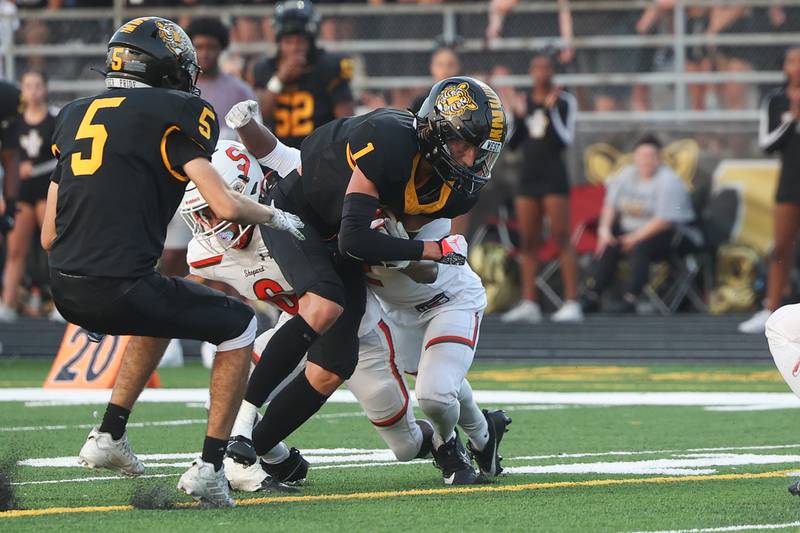 Joliet West’s Ian Farrell surges forward for a few extra yards on a catch and run against Shepard on Friday, Aug. 25, 2023 in Joliet.