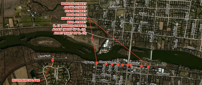 To create a 'Quiet Zone' on the downtown RailNet railroad tracks, Yorkville must decide to upgrade or eliminate each of the current pedestrian track crossings shown in the photo.