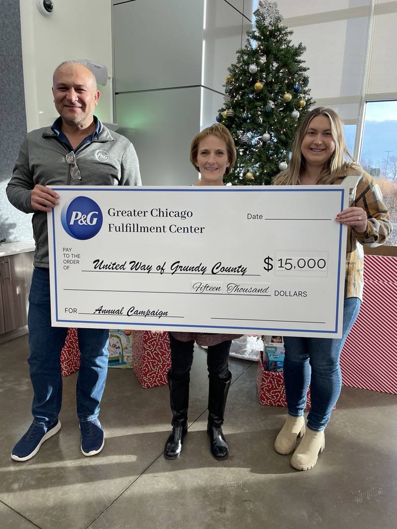 Pictured L to R:  Oguzhan Orucoglu, P&G Site Leader, Karen Nall, United Way of Grundy County, Megan Braun, P&G HR Specialist