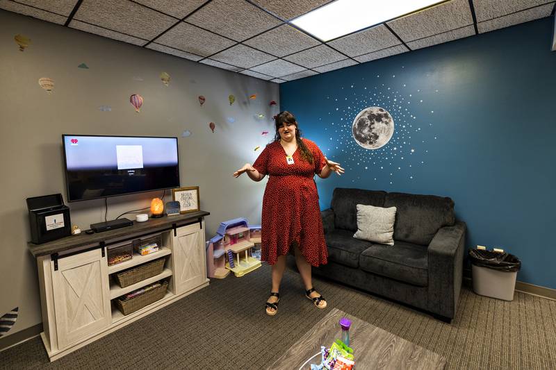 Shining Star Forensic Interviewer Bailey Robinett talks about the first waiting room Wednesday, July 23, 2025, during an open house of the child advocacy center.