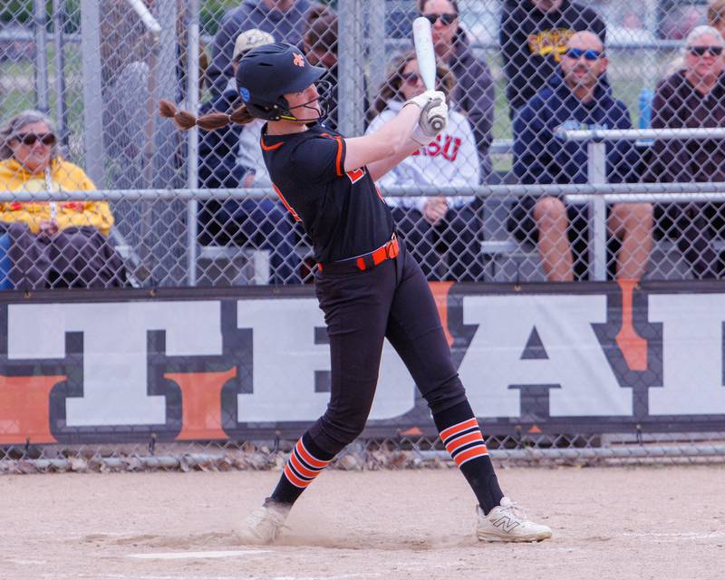 St. Charles East's Emily Moline hits a three run home run against Schaumburg at the Class 4A St. Charles East Regional Final on Friday, May 22,2026 in St. Charles.