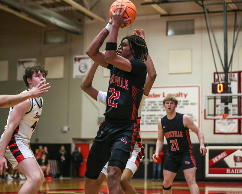 Yorkville's Braydon Porter (22) puts up a shot during their Class 4A Bolingbrook Sectional semifinal basketball game between Yorkville at Benet, March 3, 2026 in Bolingbrook.
