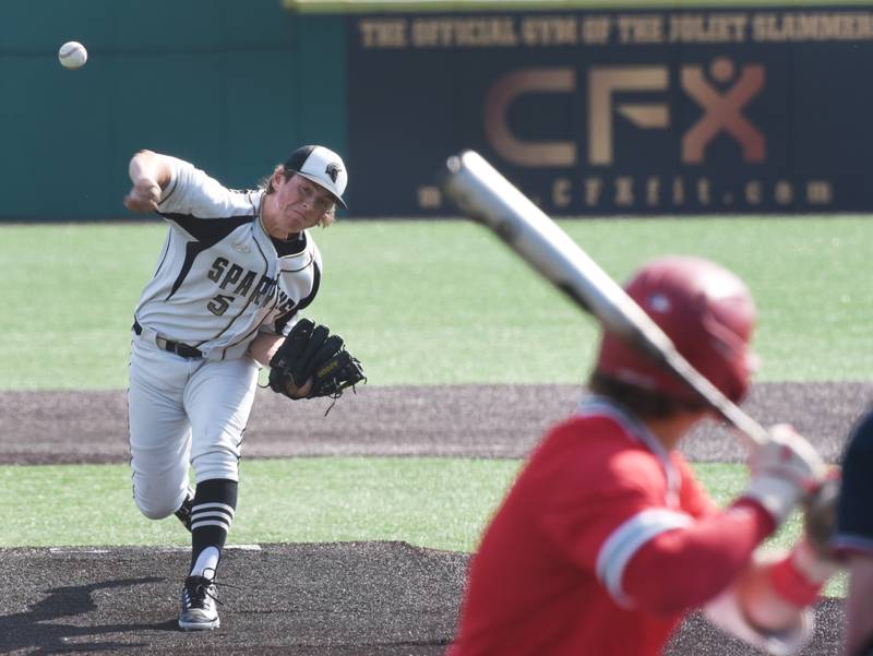 Joe Lewnard/jlewnard@dailyherald.com
Sycamore starter Owen Piazza delivers a pitch against Effingham during the Class 3A  third-place state baseball game in Joliet Saturday.