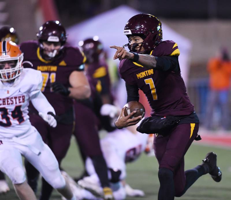 Montini’s Israel Abrams carries the ball on a quarterback keeper during the IHSA Class 4A state championship game against Rochester on Friday, Nov. 28, 2025 in Normal.