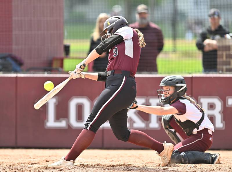 Lockport's Ava Swain connects with the ball during the non-conference game against Marengo on Saturday, April. 27, 2024, at Lockport.