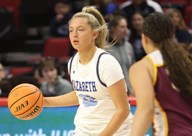Nazareth's Macy Polito dribbles outside the key against Loyola during the Class 4A State girls basketball championship game on Saturday, March 7, 2026 at CEFCU Arena in Normal.