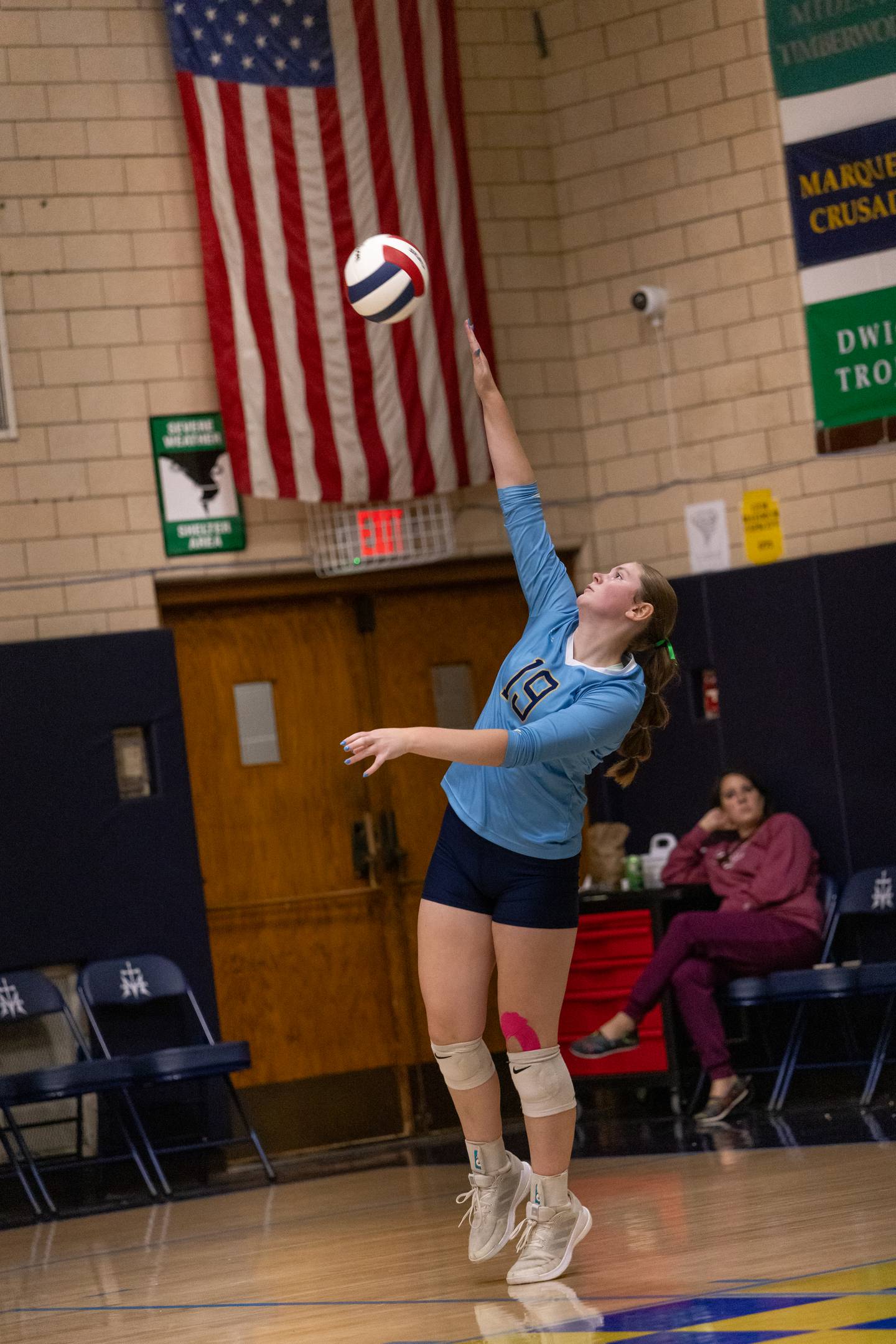 Kelsey Cuchra serves the ball against Seneca High School during the match at Bader Gym on September 25, 2025 at Marquette High School.