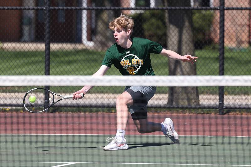 Coal City’s Jakob Boegerhausen returns a shot in his match against Joliet Catholic on Saturday, April 6, 2024 in Joliet.