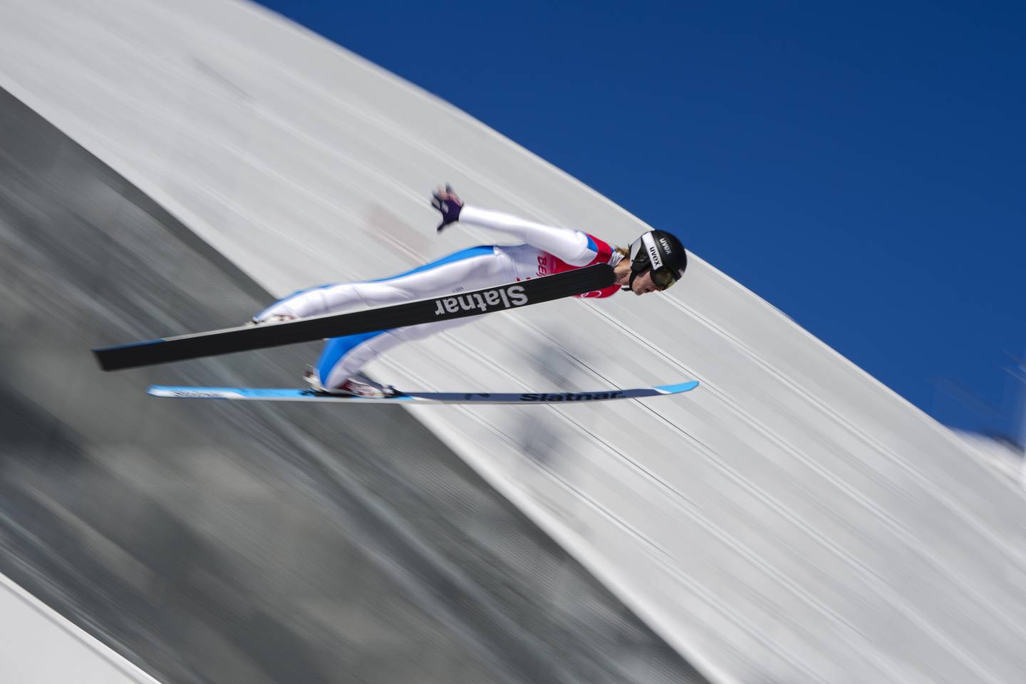 Kevin Bickner, of the United States, soars through the air during the men's normal hill individual ski jumping trial round at the 2022 Winter Olympics, Saturday, Feb. 5, 2022, in Zhangjiakou, China.