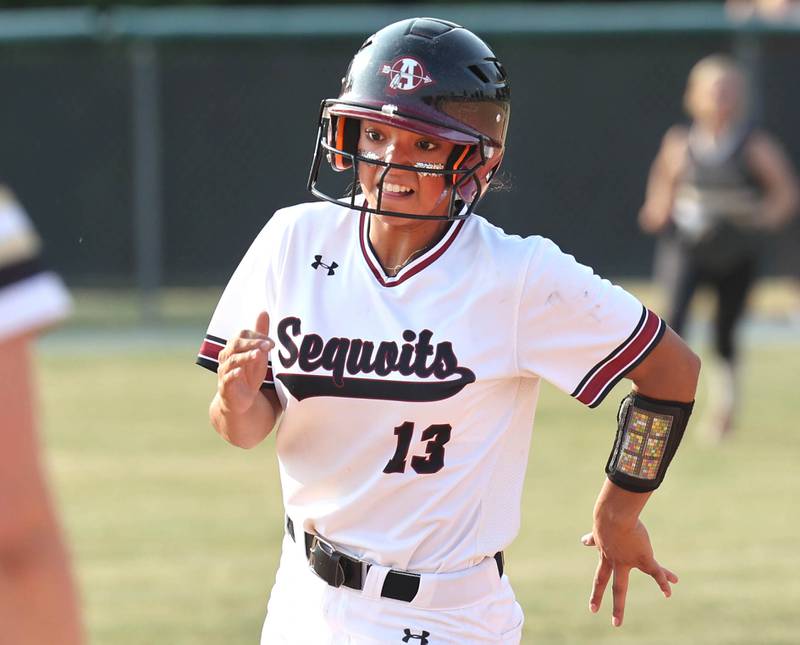 Antioch's Eden Echevarria runs to third during their Class 3A supersectional game Monday, June 5, 2023, against Sycamore at Kaneland High School in Maple Park.