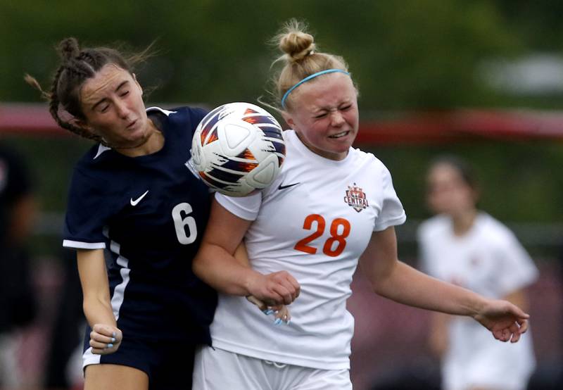 Crystal Lake Central's Allison Barnett heads the ball away from St. Viator's Ella Dean during the IHSA Class 2A Deerfield Sectional championship girls soccer match on Friday, May 30, 2025, at Deerfield High School.