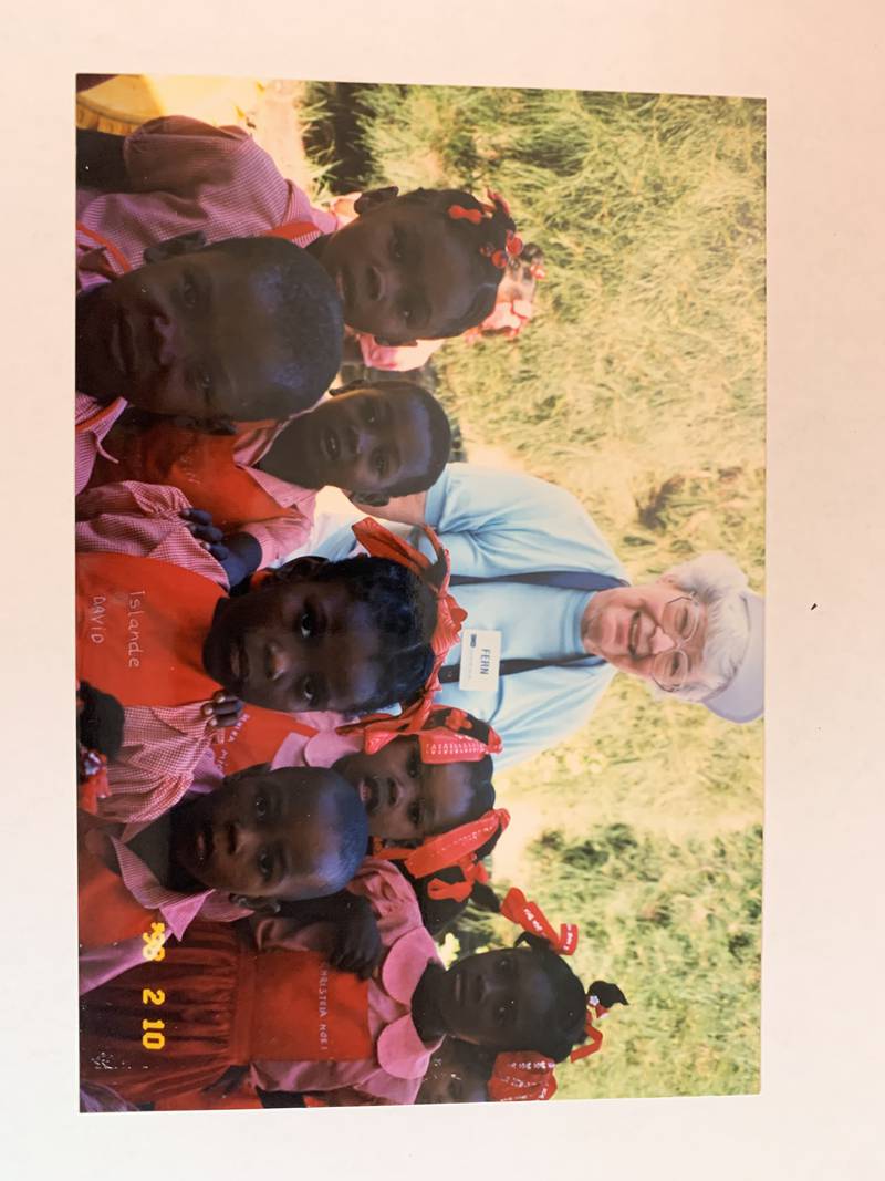 For decades, Sterling teacher Fern Shore (center) donated what she could to Hope for Haitians to build homes in that country, The organization announced Wednesday, Aug. 20, 2025, that Shore, prior to her death last fall, bequeathed 741 shares of McDonald's stock to the organization. The gift came in at $220,000. This photo shows Shore during a trip to Haiti.