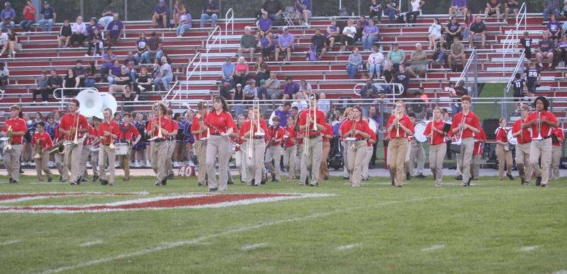 Members of the Ottawa High School marching band performs before the game against Plano on Friday, Aug. 30, 2024 at King Field.