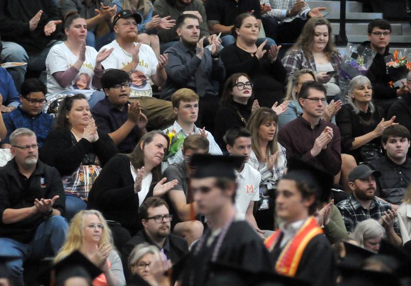 People claps for some of the graduates that are hiding to military service after high school on Saturday, May 21, 2022, during the McHenry High School’s 102nd Commencement Ceremony in the gym of the school’s Upper Campus. The ceremony was moved inside and split into two ceremonies because of the rainy weather.