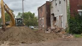 One downtown Sterling building down, another likely to be felled next week