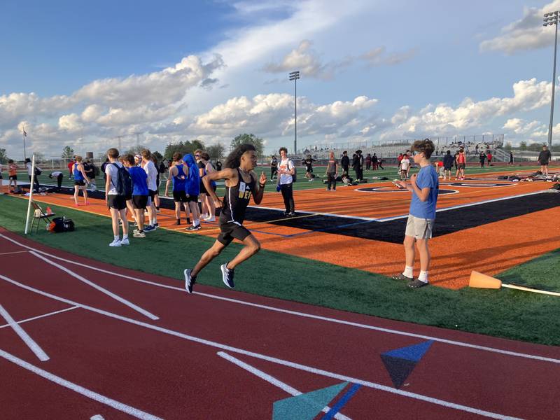 Joliet West's Marcellus Mines makes the turn into the final lap of the 800 on Monday, April 29, at the Lincoln Way West Invitational.