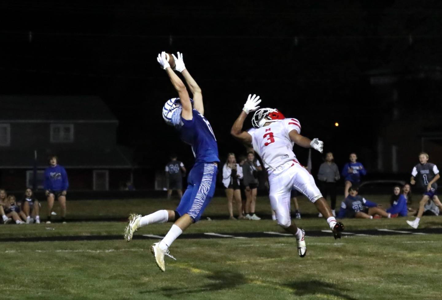 Princeton's Noah LaPorte snags a 30-yard touchdown pass to give the Tigers a 21-19 lead with 45 seconds left Friday night.