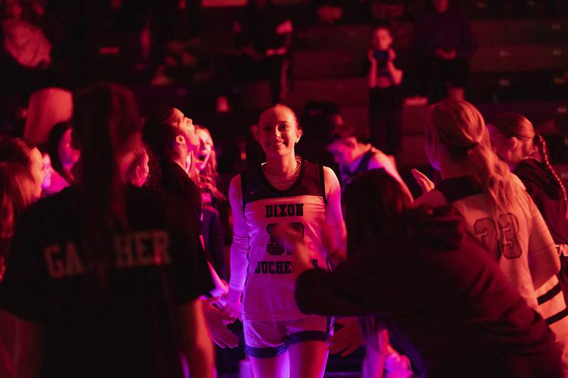 Dixon's Makenzie Toms comes out during introductions against Rock Falls Friday, Jan. 31, 2025, at Dixon High School.