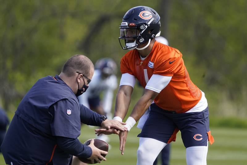 Chicago Bears quarterback Justin Fields (1) during the NFL football team's rookie minicamp Friday, May, 14, 2021, in Lake Forest Ill. (AP Photo/David Banks, Pool)