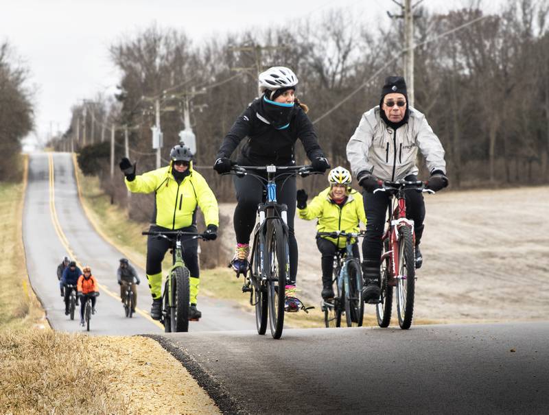 Dawn Moore (left) from Amboy and BJ Fenwick, from Sterling, lead the Rock River Valley Bicycle Club's New Year's Day Ride Jan. 1, 2019 along Sink Hollow Road in rural Lee County Tuesday afternoon. The ride started in 1989 and Green River Cyclery owner, BJ Fenwick, is the only rider to have participated in all of the rides.