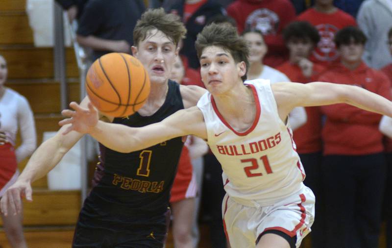 Streator’s  Brennen Stilwell knocks t a pass away intended for Was Peoria’s Jackson Ahrens during the 2nd period Wednesday at Streator.