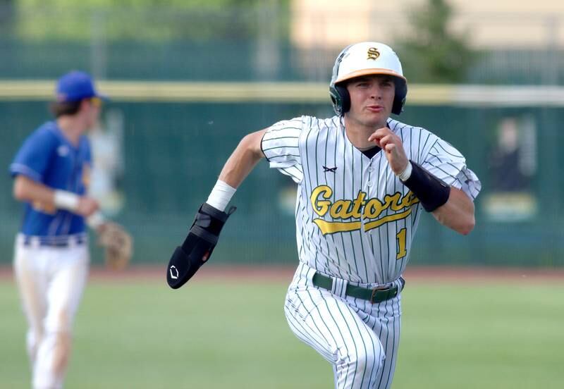 Crystal Lake South’s Dayton Murphy heads toward home against Lake Forest in Class 3A baseball regional action at Crystal Lake Thursday.
