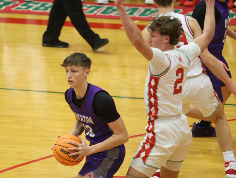 Dixon's Beckham Rock looks to pass the ball around L-P's Regan Doerr on Tuesday, Jan. 20, 2026 in Sellett Gymnasium at L-P High School.