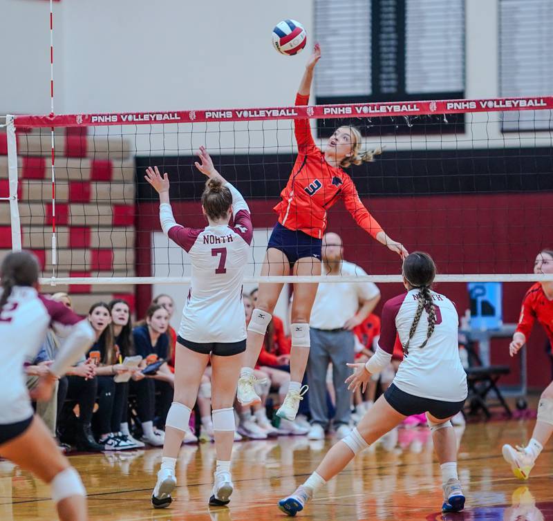 Oswego’s Riley Borrowman (3) goes up for a kill against Plainfield North during the class 4A Plainfield North regional volleyball final at Plainfield North High School on Thursday, Oct. 26, 2023.