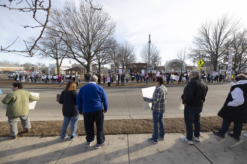 Protestors line up along East Fourth Street in Sterling Tuesday, Feb. 25, 2025, to express their displeasure for the current Presidential administration.