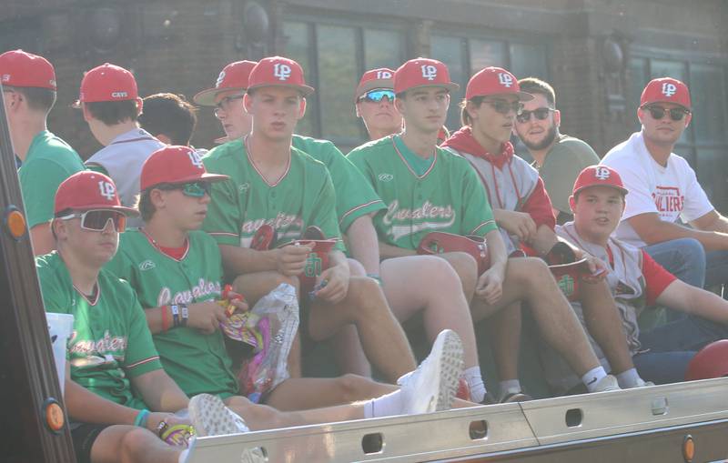 The L-P baseball team rides a float during the L-P homecoming parade on Thursday, Oct. 2, 2025 downtown Peru.