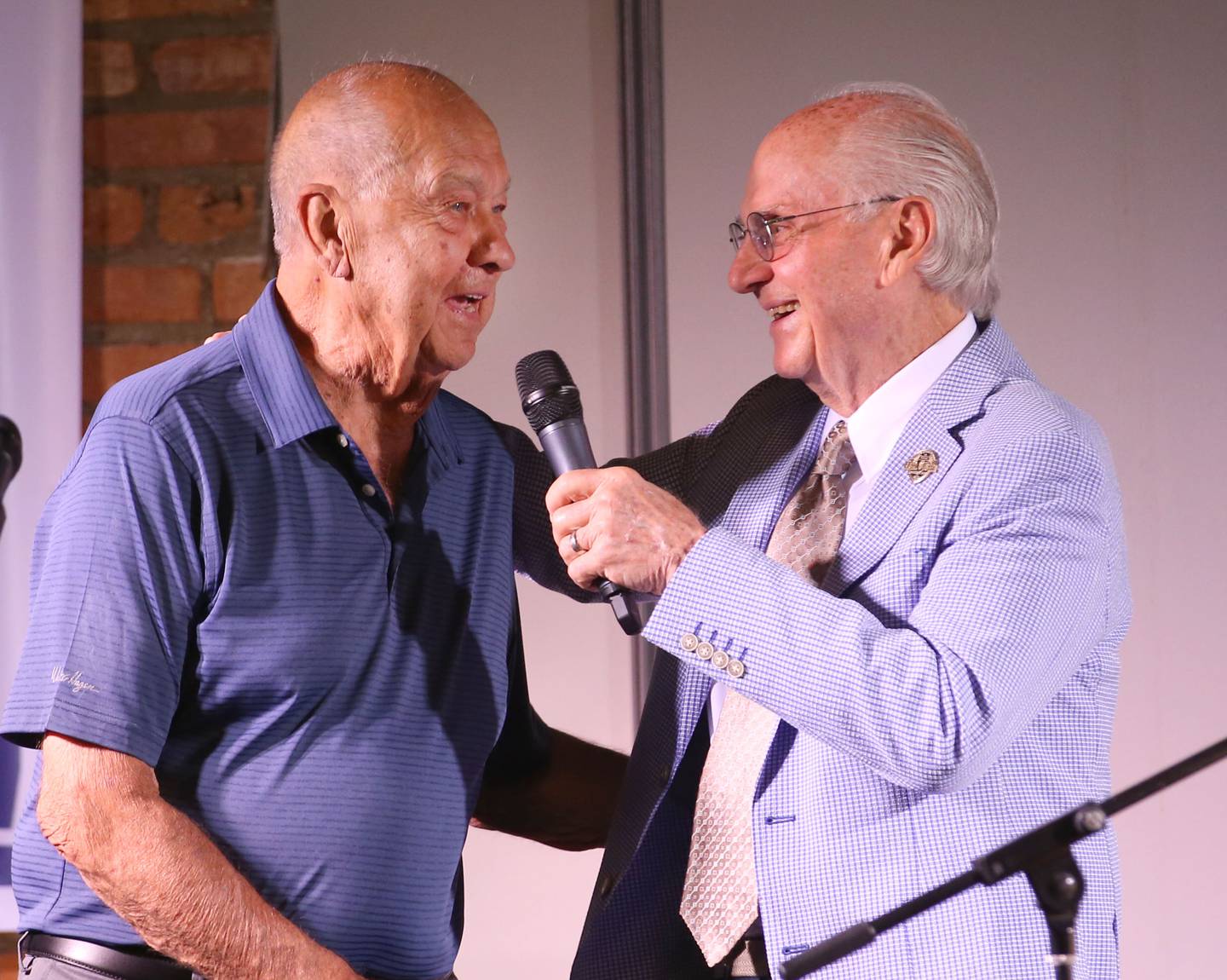 Bob Prusator, legendary basketball coach at Tiskilwa High School is interviewed by Lanny Slevin Emcee, during the Shaw Media Illinois Valley Sports Hall of Fame on Thursday, June 8, 2023 at the Auditorium Ballroom in La Salle.