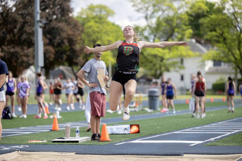 L-P’s Aubrey Duttlinger takes off in the long jump Wednesday, May 14, 2025, during Sectionals at Sterling High School.