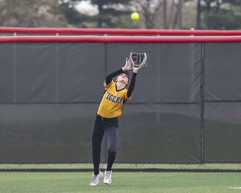 Joliet West's Caitlin Jadron (11) makes a catch in the outfield during softball game between Joliet West at Yorkville on Wednesday, April 30, 2025 in Yorkville.