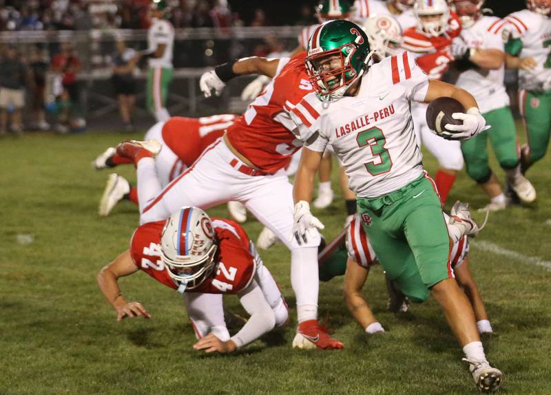 L-P's Rylynd Rynkewicz breaks free as Ottawa's Joey Liebhart falls to the ground on Friday, Sept. 12, 2025 at King Field.