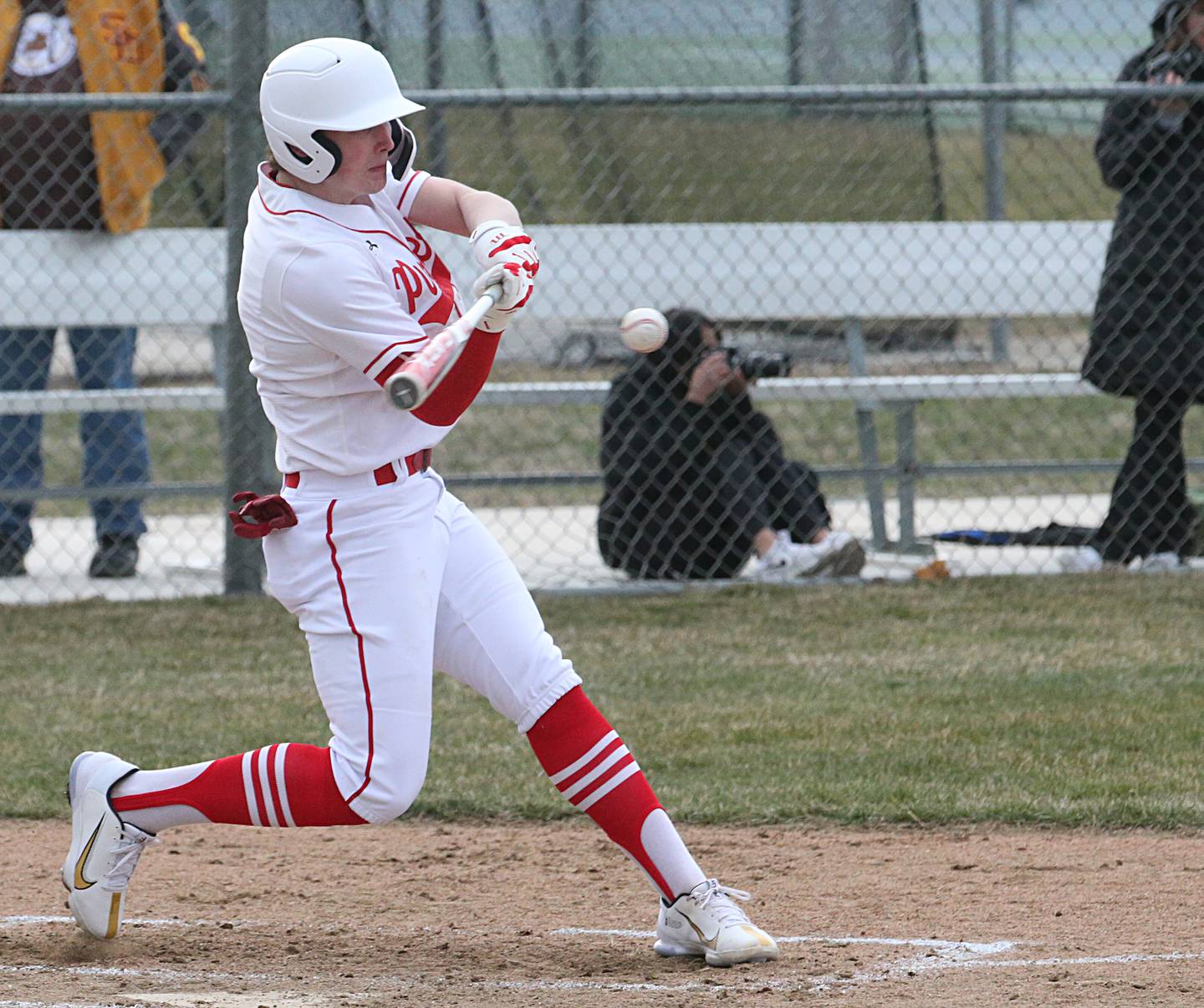 Ottawa's Packston Miller smacks a hit against Serena on Tuesday, March 21, 2023 at Ottawa High School.