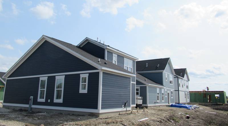 Several structures now stand on the construction site of Avanterra, located at the southeast corner of Wolf’s Crossing and Douglas Roads. Photo taken Sept. 15 2022.