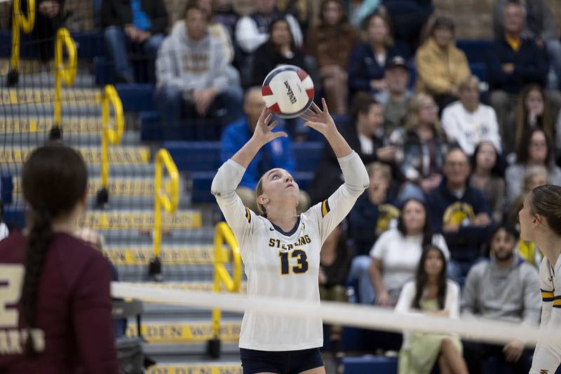 Sterling’s Sydney Giffin sets the ball against Morris Thursday, Oct. 30, 2025, in the Class 3A volleyball regional.