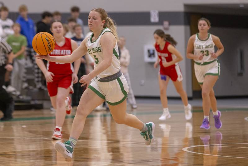 Seneca's Lauryn Barla runs the ball down the court in the game against Streator High School during the Falcon-Irish Girls Basketball Tournament on November 19, 2024 at Seneca High School.
