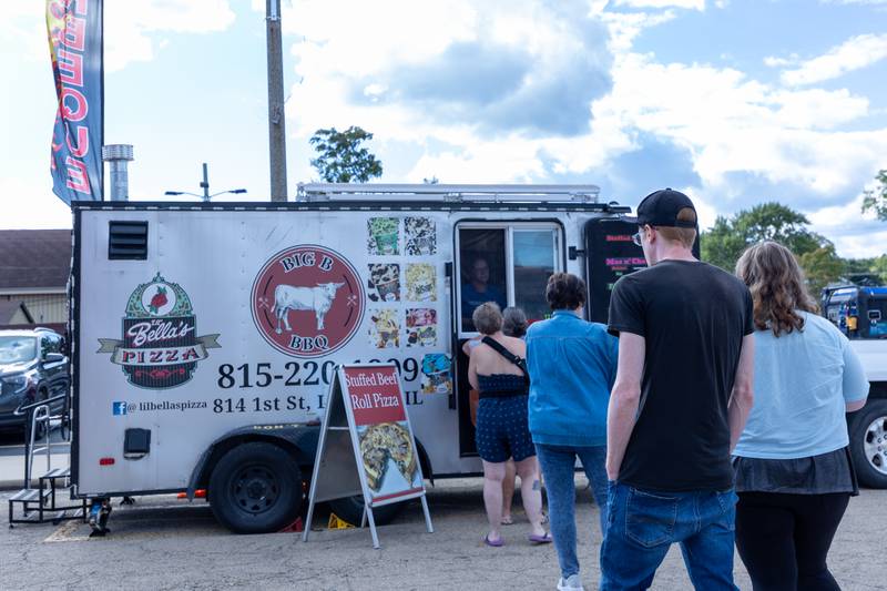 Customers await to order from Big B BBQ on Monday, Aug 25, 2025 on Illinois Avenue in Mendota.