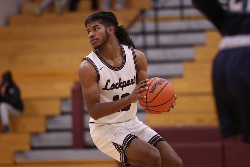 Lockport’s Jalen Falcon looks for a play against Plainfield South on Wednesday January 25th, 2023.