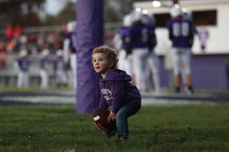 Jaxon Butler, 2, plays in the end zone before Wilmington’s game against Stillman Valley in the first round of the playoffs on Saturday, Nov. 2, 2024 in Wilmington.