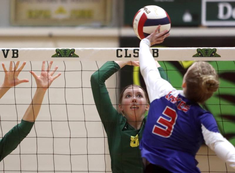 Crystal Lake South’s Anastasia Hougas blocks against Lakes in IHSA Class 3A Sectional semifinal volleyball action on Tuesday, Nov. 5, 2024, at  Crystal Lake South High School  in Crystal Lake.